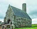 Церковь св. Камина и башня на о-ве Холи-Айленд (Инишкялтра). XI–XII вв.