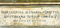 Объявление об индульгенции на фасаде базилики Сан-Джованни ин Латерано в Риме