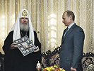 Президент Российской Федерации В. В. Путин и Патриарх Московский и всея Руси Алексий II. Фотография. 19 мая 2003 г. Фото: mospat.ru 
