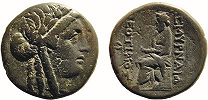 Голова Аполлона. Гомер. Бронзовая монета, отчеканенная в Смирне. Ок. 145–125 до Р.Х. Аверс. Реверс.